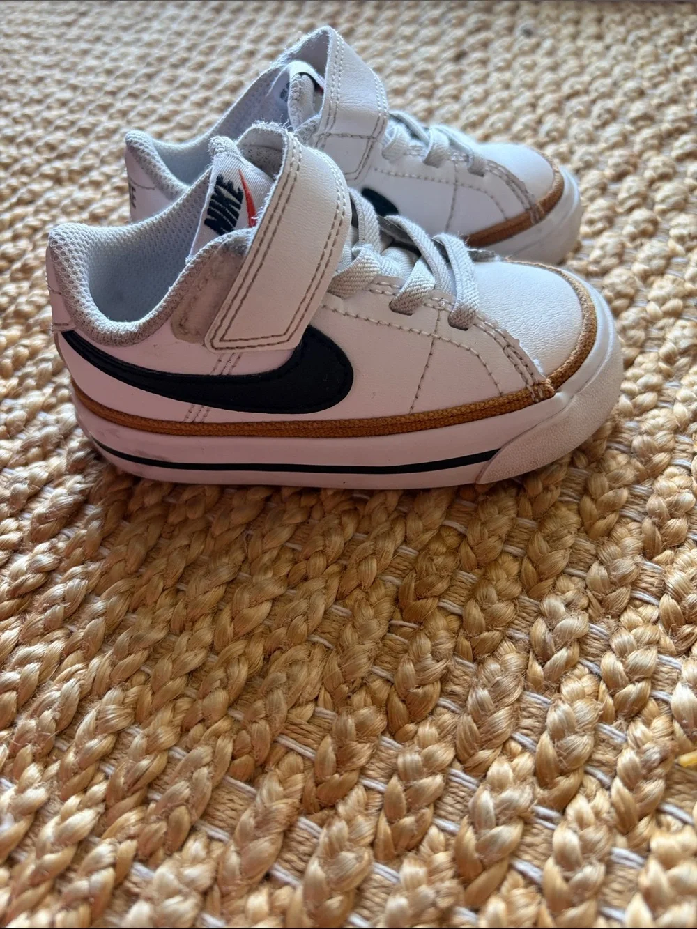 Nike Kids White Sneakers with Black Swoosh and Tan Trim
